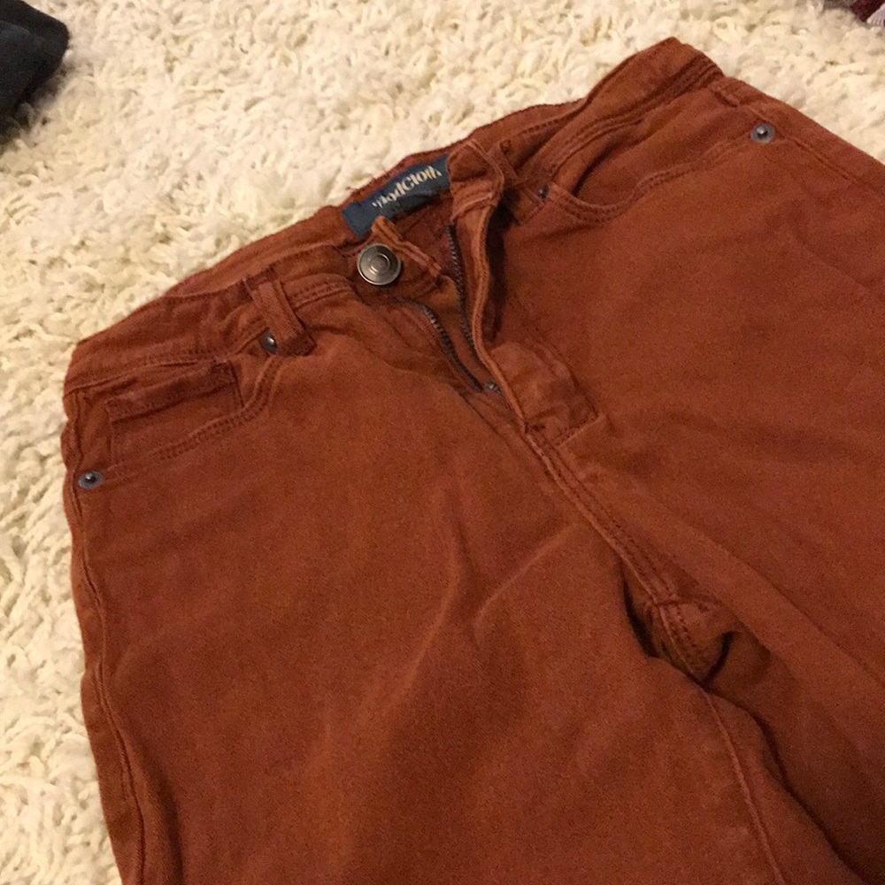 Rust skinny jeans